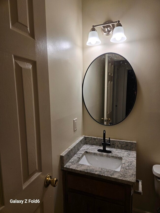 One of Upstair Bathroom - 5552 Estates Ct