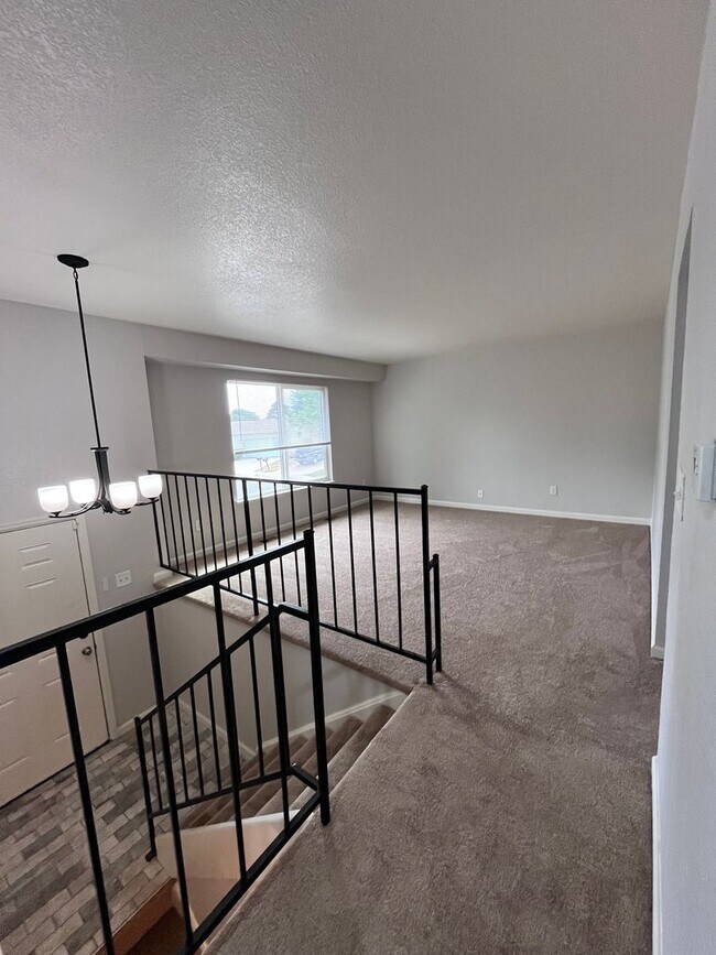 Building Photo - Welcome home to your updated 4-bedroom, 2 ...
