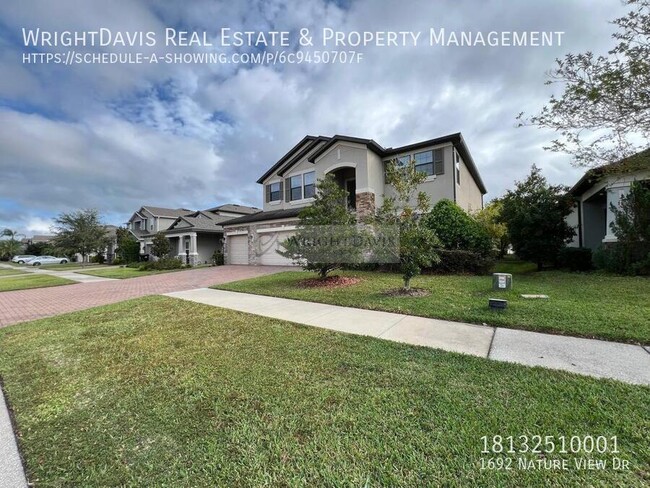 Foto del edificio - Stunning 5/5 pool home in Long Lake Ranch!