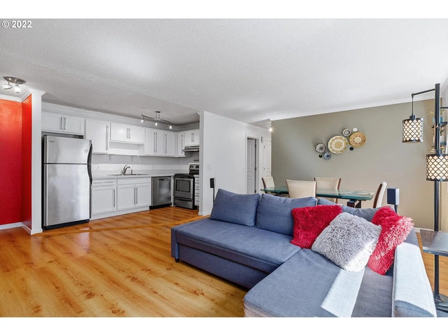 Building Photo - NE  ~ Charming  2 Bedroom 1 Bathroom Condo! Reserved Parking, Storage , Some Utilities Included! ...