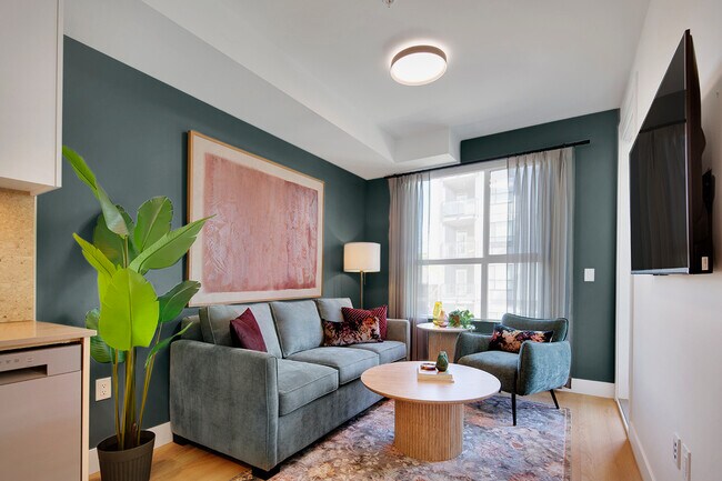 Building Photo - Modern Two-Bedroom Home with Balcony, Parking & Resort-Style Amenities