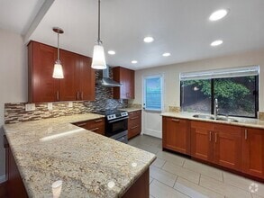 Building Photo - 6050 Henderson Dr
