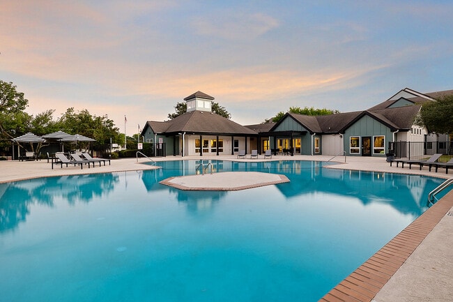 The-Outpost-San-Marcos-Apartments-Near-Texas-State-University-Resort-Style-Pool-Sunset - The Outpost