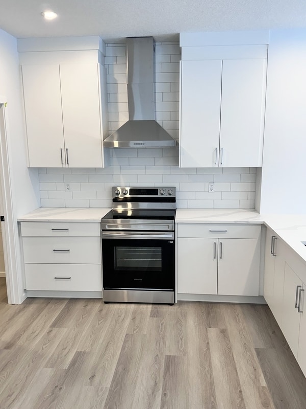 Photo du bâtiment - 7741-174A 174A Ave NW