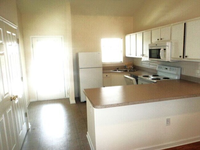 Foto del edificio - Independence South one level brick patio h...