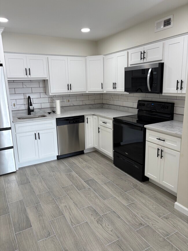 Foto del edificio - 4334 Arrow Tree Dr