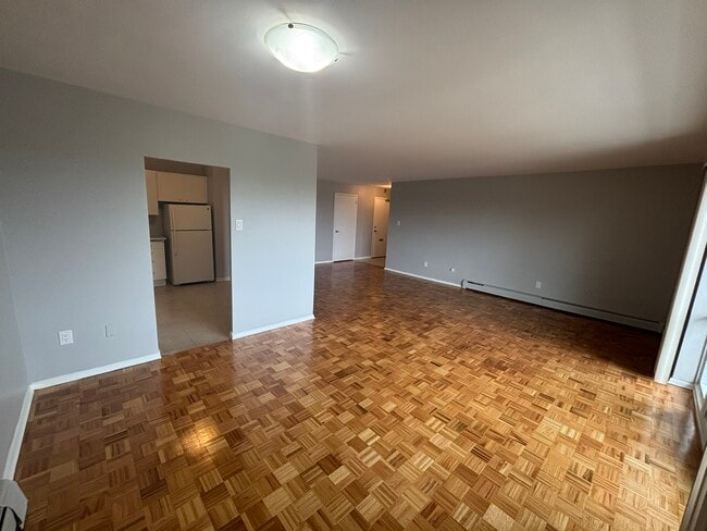 Building Photo - 1061 Queen's Blvd