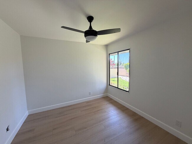Building Photo - Completely Remodeled 3-Bedroom Home with Open-Concept Living