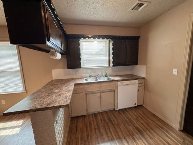 Photo - All brand new inside! A true 4 bedroom in Moore Schools, no carpet, All luxury vinyl plank! House