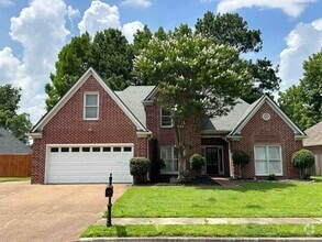 Building Photo - 8570 Meadow Green Dr