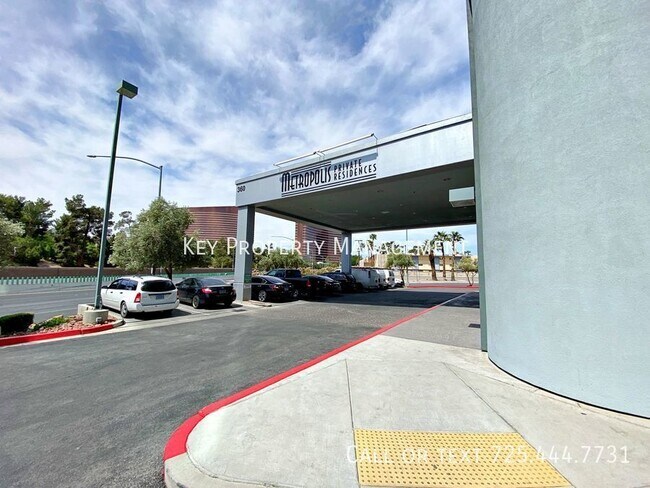 Building Photo - High Rise Metropolis 2 bedroom Condo with ...