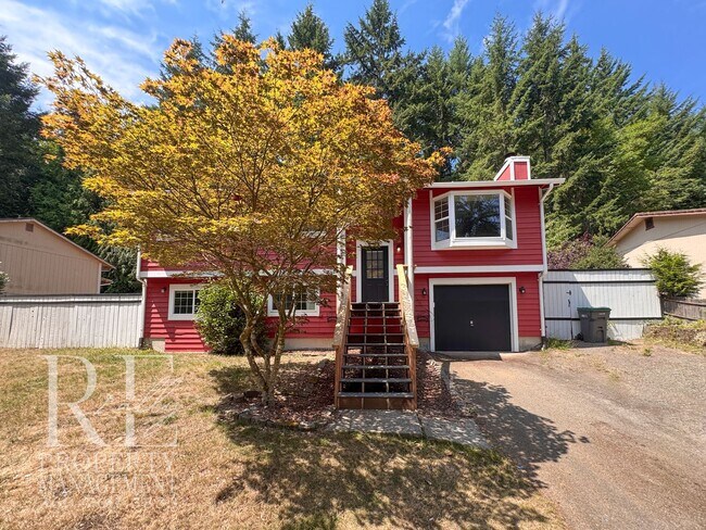 Building Photo - Freshly Painted East Bremerton Home with Expansive Decks & Flexible Living Space