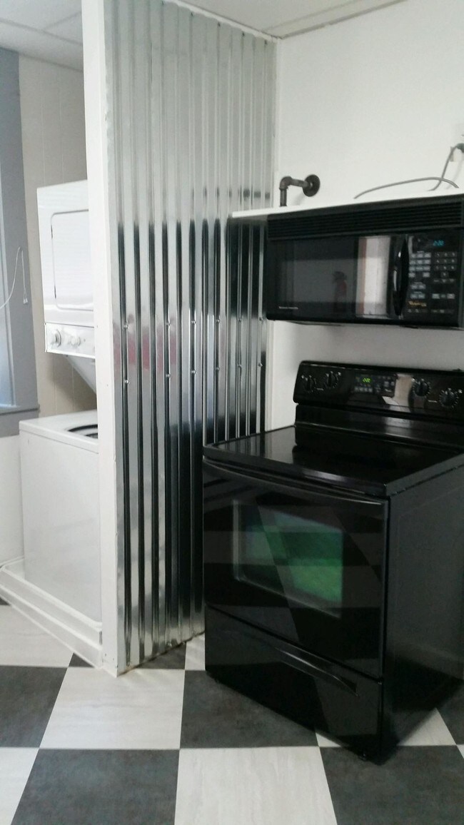 Washer/dryer/stove and microwave - 104 1st St E