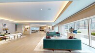 This expansive single-floor space offers an impressive combination of refined design and functional versatility. Wide-plank light hardwood flooring flows throughout, unifying the open layout and complementing the bright, neutral palette. Coffered ceilings with integrated ambient lighting lend an elevated sense of elegance to the main gathering areas, while large floor-to-ceiling windows and sliding glass doors flood the interior with natural light and frame striking urban views.

The primary living areas are generously proportioned, featuring multiple distinct seating arrangements with curated contemporary furnishings. Artwork is thoughtfully displayed throughout, giving the space a gallery-like quality. A sleek, curved kitchen island with a marble countertop anchors the dining zone, complemented by rich wood cabinetry and a dramatic row of brass pendant chandeliers overhead — an ideal setup for entertaining.

In contrast, the library lounge offers an intimate and dramatic atmosphere, distinguished by an ornate hand-painted ceiling mural depicting cranes in flight, dark wood bookshelves, textured wall coverings, and plush seating. An adjoining study area features a statement table and additional built-in shelving.

A private room with floor-to-ceiling built-in cabinetry and sheer-draped windows overlooking the city skyline provides a serene retreat. Together, these spaces deliver a cohesive blend of artistry, comfort, and sophistication.
