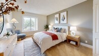 Unit 511 at 250 Baldwin Ave in San Mateo, CA offers a well-designed one-bedroom layout across a single floor. Light-toned hardwood flooring flows throughout the main living areas, creating a cohesive and airy feel. The living room is bright and inviting, highlighted by large sliding glass doors that open onto a private balcony with tree-lined views — an ideal spot for relaxing or entertaining. The kitchen is outfitted with white cabinetry, stone-look countertops, and a full suite of stainless steel appliances, including a refrigerator, electric range, and over-the-range microwave. The generous bedroom features carpeted flooring, a large window with outdoor views, and ample natural light, complemented by a dedicated walk-in closet with built-in shelving for organized storage. The layout also includes two hallways that provide practical connectivity between rooms. Neutral wall tones and clean finishes throughout lend the space a modern, move-in-ready aesthetic. Located in the heart of San Mateo, this unit combines functional design with comfortable, contemporary living in a prime Peninsula location.