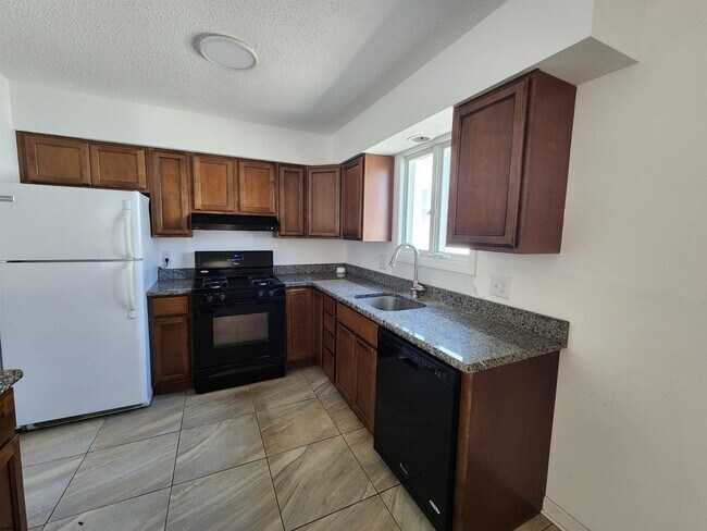 Foto del edificio - 106 N Dudley Ave