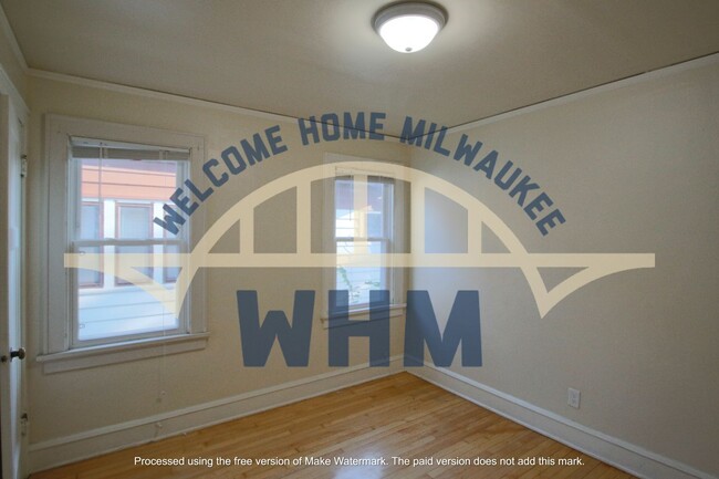 Building Photo - Spacious Corner Duplex Living Awaits!