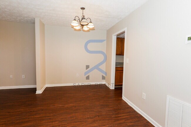 Foto del edificio - Suburban Serenity, Atlanta Proximity – Elegant 2BR/2.5BA in Wellington Chase