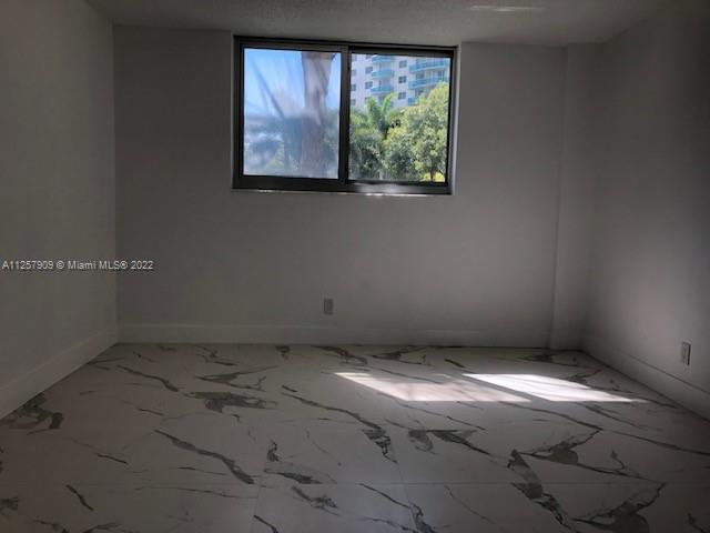 Building Photo - 19380 Collins Ave