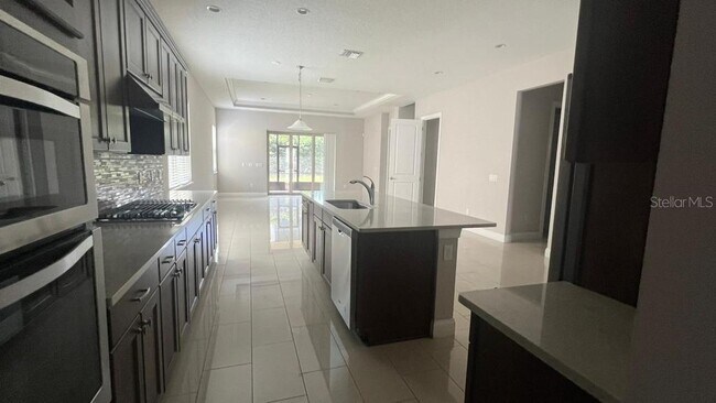 Building Photo - 10349 Royal Cypress Way