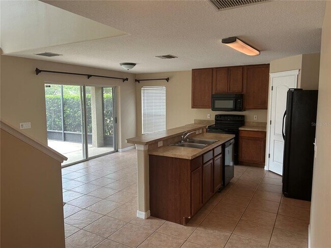 Foto del edificio - 5828 Wrenwater Dr