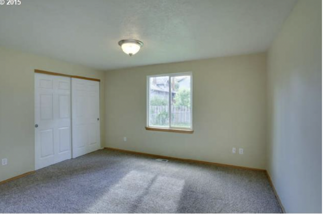 Bedroom 1- now with wood floor - 6925 SE 65th Ave