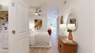 Located at 2820 Hibiscus Ave in Boulder, CO, this thoughtfully designed one-bedroom, one-bathroom residence maximizes every square foot with a smart, functional layout across a single floor. Light wood-look flooring flows throughout, complementing the bright white walls that lend a clean, airy ambiance to the entire space.

The kitchen is a standout feature, outfitted with white shaker cabinetry, dark granite countertops, and a striking dark zellige tile backsplash. Stainless steel appliances — including a full-size refrigerator, dishwasher, and range — provide a polished, modern finish, while a window brings in natural light.

The living room offers a welcoming, light-filled retreat with windows overlooking the balcony, creating a seamless connection to the outdoors. The bedroom is a serene space featuring a ceiling fan, access to a dedicated closet, and neutral tones that promote a calm atmosphere.

The bathroom is finished with dark slate-style wall tile in the tub/shower surround, contrasting beautifully with the white fixtures and light flooring. Additional conveniences include a dedicated laundry area and an entrance foyer. A private balcony completes this well-appointed residence.