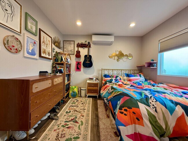 Building Photo - Modern Bungalow with W/D + A/C! Assigned Parking Included & 1 Garage Storage!