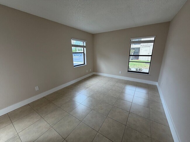 Building Photo - ANNUAL RENTAL - 2 BED / 2 BATH CONDO AT MYSTIC GARDENS
