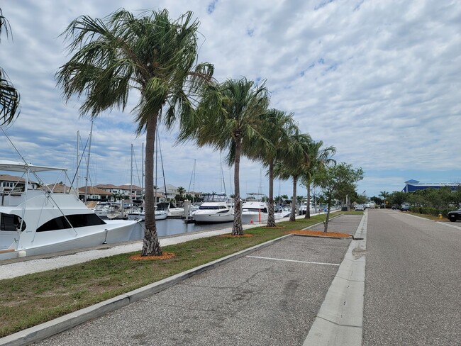 Building Photo - Live the Waterfront Yacht Club Lifestyle –...