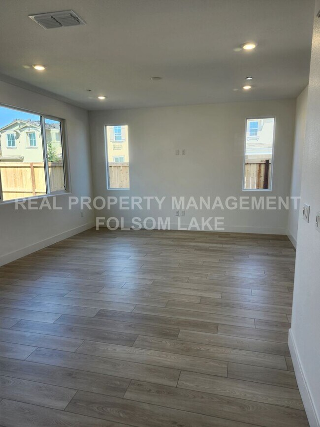 Building Photo - New 3 Bedroom 2.5 bath corner lot, split l...