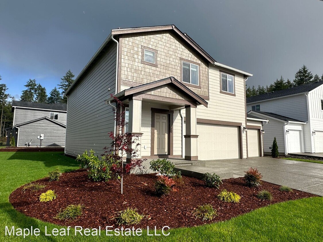 Foto principal - 4 br, 3 bath House - 21 NE Olympic Ridge
