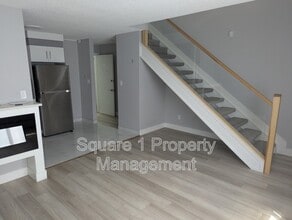Building Photo - 10725-10785 85 Ave