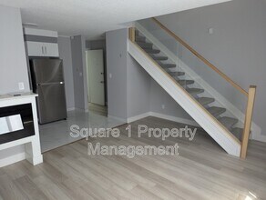 Building Photo - 10725-10785 85 Ave