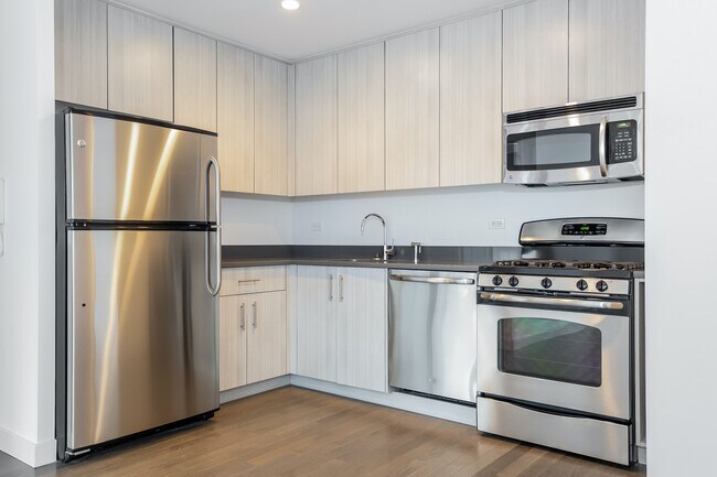 Building Photo - Bright corner one bed with W/D in unit