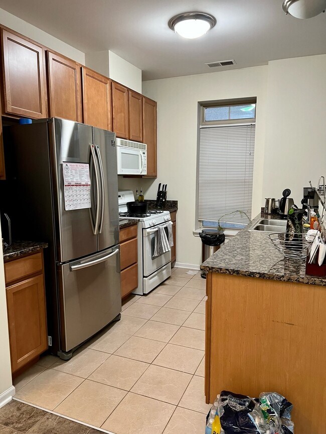 Foto del edificio - 3849 S Ellis Ave