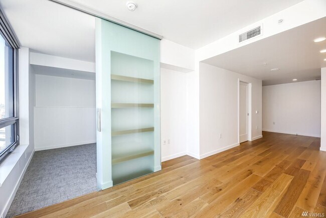 Building Photo - Spacious NW-Facing 1 Bed + Den, 1 Bath Luxury High-Rise Condo in Seattle's Denny Triangle – Nexus