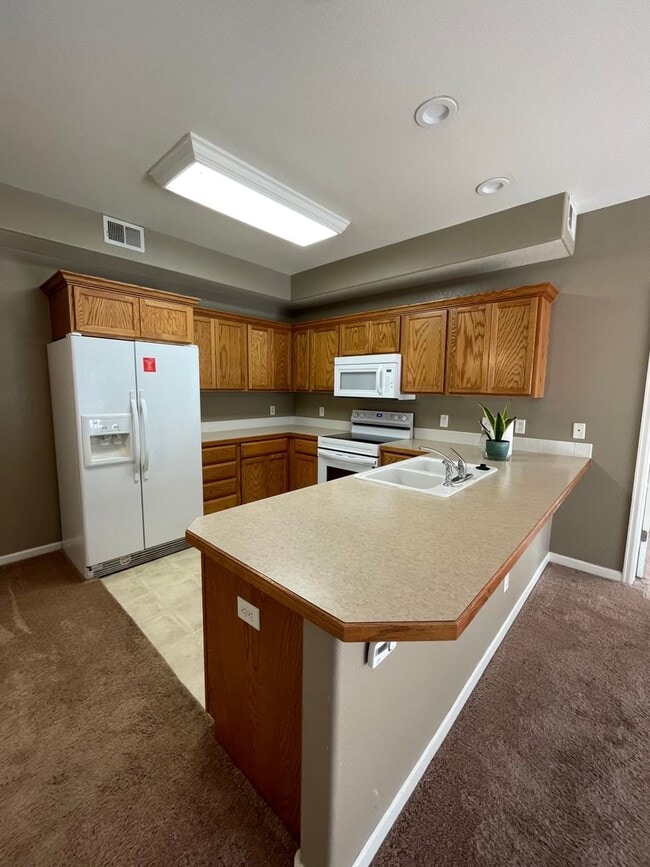 Building Photo - Charming Main Floor Condo in Water Valley