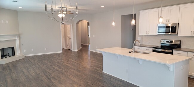 Building Photo - BEAUTIFUL NEW HOME in the Desirable Hedgef...