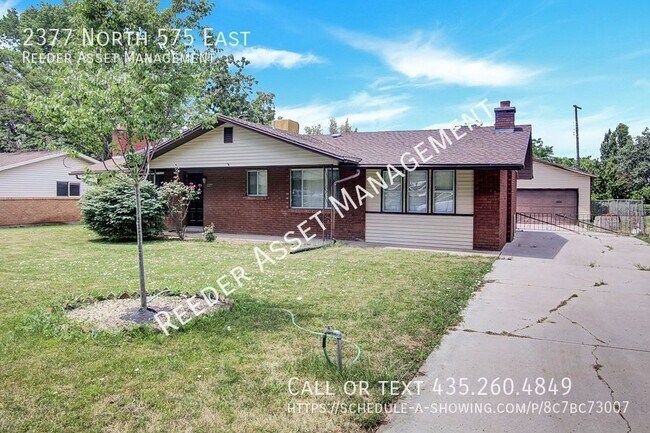 Building Photo - Welcome to this charming 4-bedroom, 2-bath...