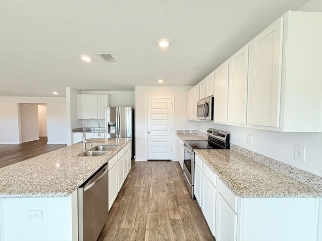 Building Photo - Spacious 4-Bedroom Home - Open Floor Plan