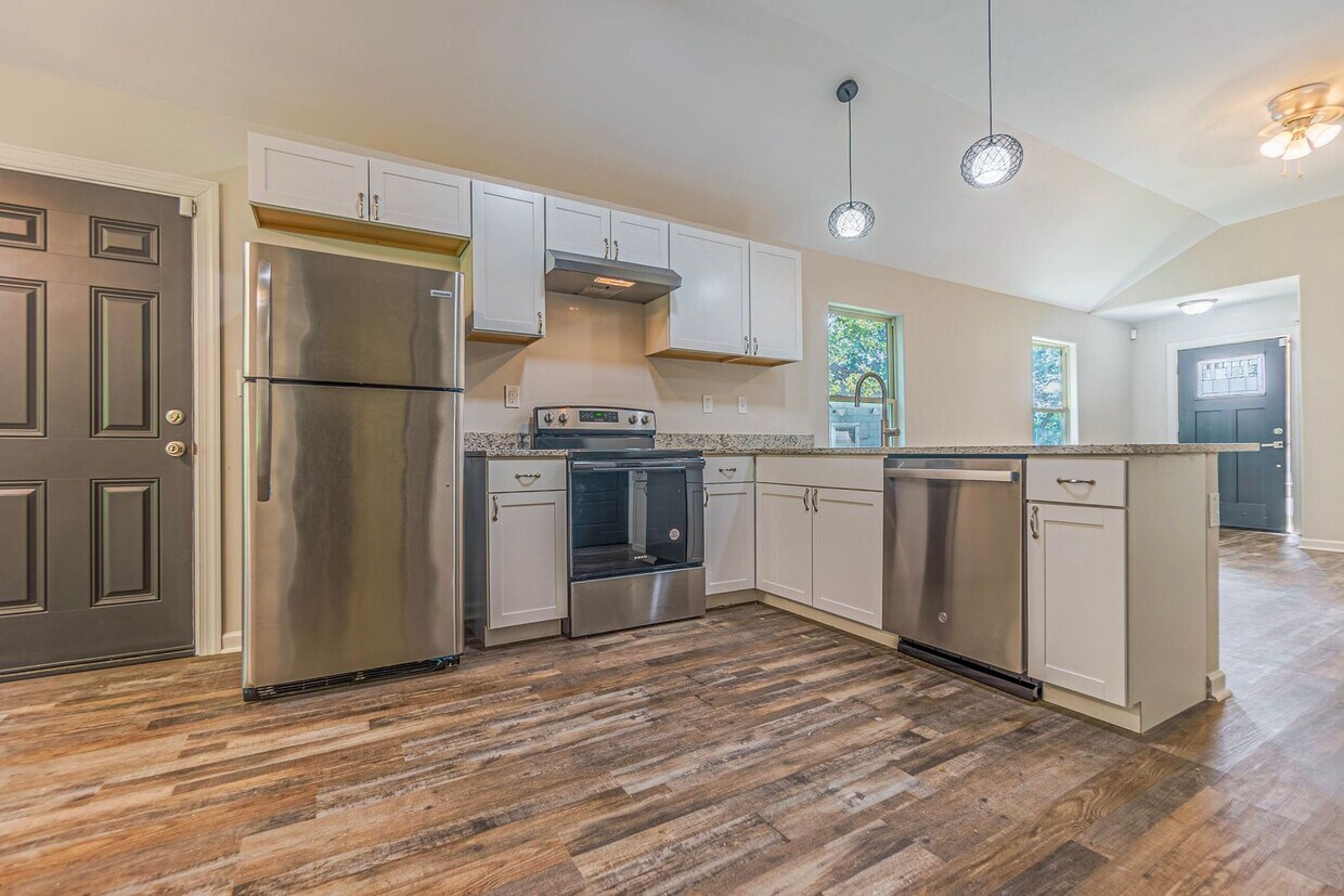 Primary Photo - Spacious Four-Bedroom Two-Bath Home on One...