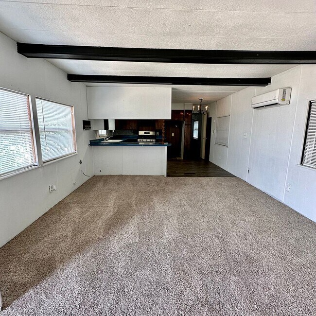 Building Photo - Move in Special 1/2 off first full months ...
