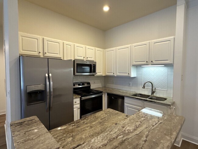 Building Photo - Beautiful condo in Garden Districe