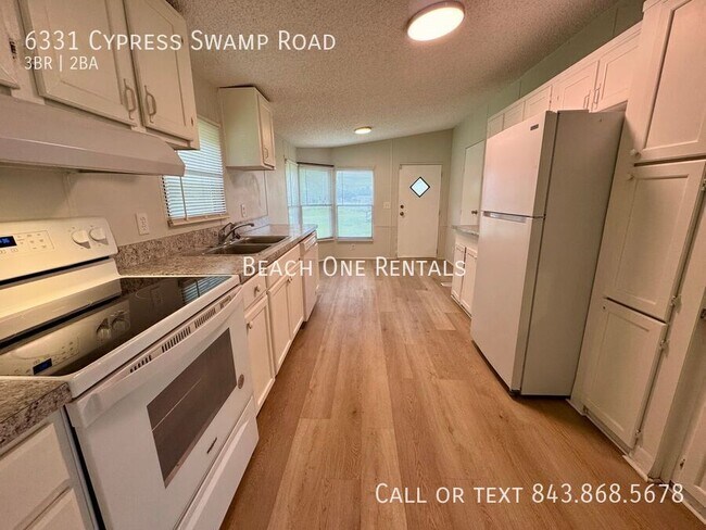 Foto del edificio - 6331 Cypress Swamp Rd