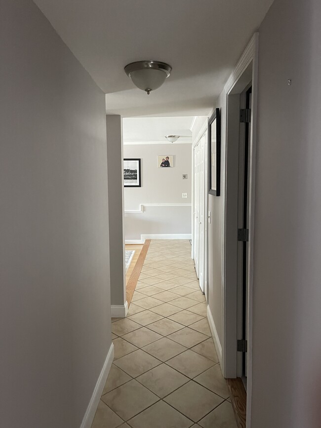 Down the hall is a full bath and 2 bedrooms - 125 Van Zandt Ave