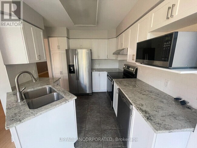 Photo du bâtiment - 202 Forestglade Crescent