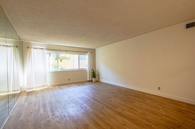 Living Room and Windows - 1025 N Kings Rd