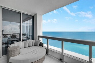 Building Photo - 6899 Collins Ave