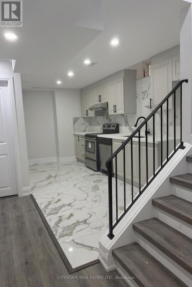 Photo du bâtiment - 5582 Meadowcrest Ave